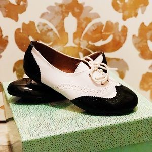 Black and white classic shoe.